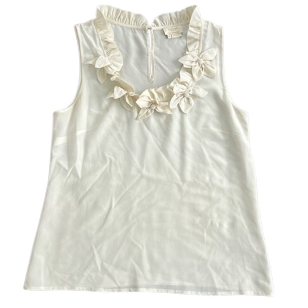 Kate Spade silk sleeveless blouse cream color with flower details.XS